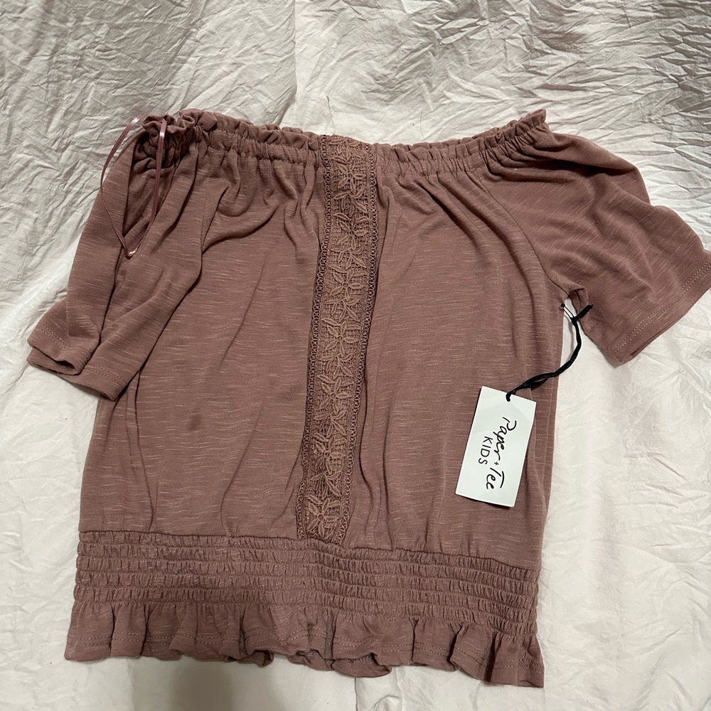 Paper + Tee kids blouse. It’s a purple pinkish color.